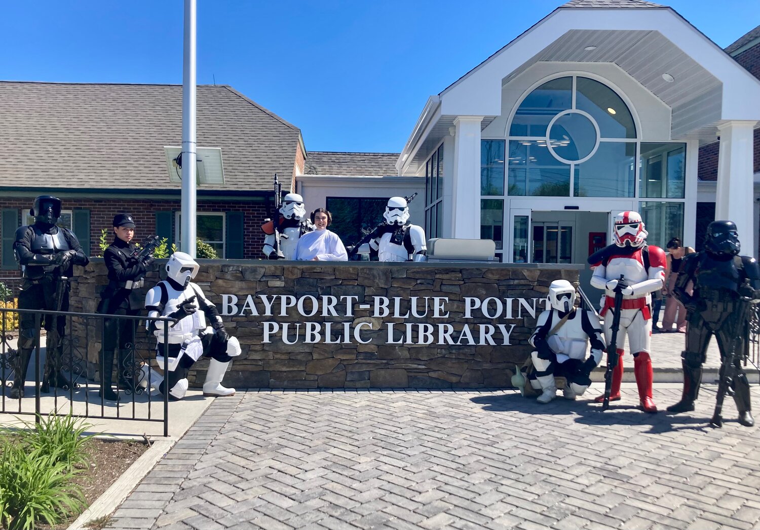 Members of the 501st Legion, volunteers who don cinema-accurate replicas of the Imperial Stormtrooper, helped the Bayport-Blue Point Library celebrate a belated May 4.